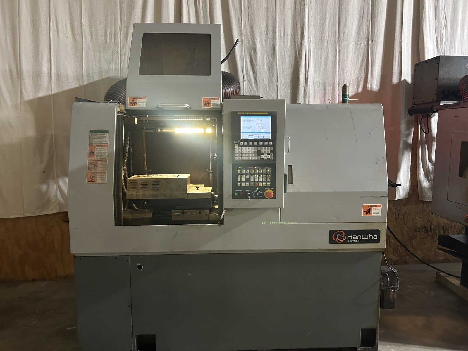 Hanwha SL-20S CNC Swiss Lathe, 2008 – Subspidle, 12′ Barfeeder